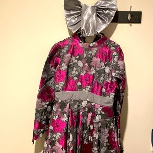 Multicolored ballgown dress with high-low cut and inbuilt skirt worn once.